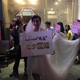 Little Delan’s sign says “I am the ex-wife of a gay man. Seeking marriage at Qixi.”